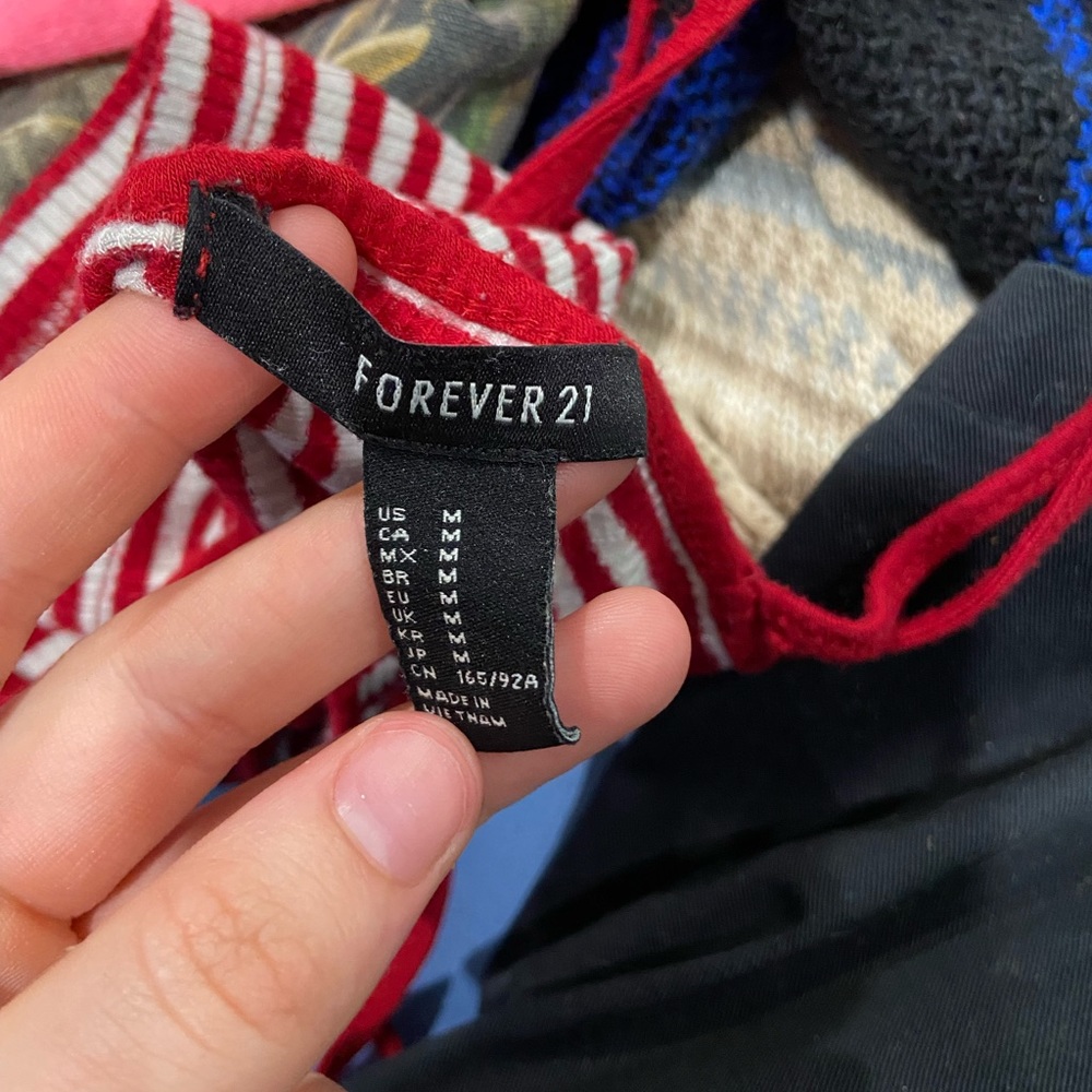 cute crop top from forever 21 it’s red and white and has a miner whole